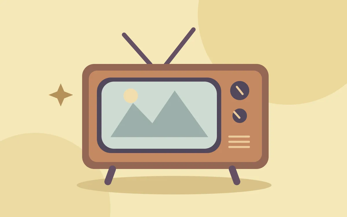 A vintage television showing mountains and the sun